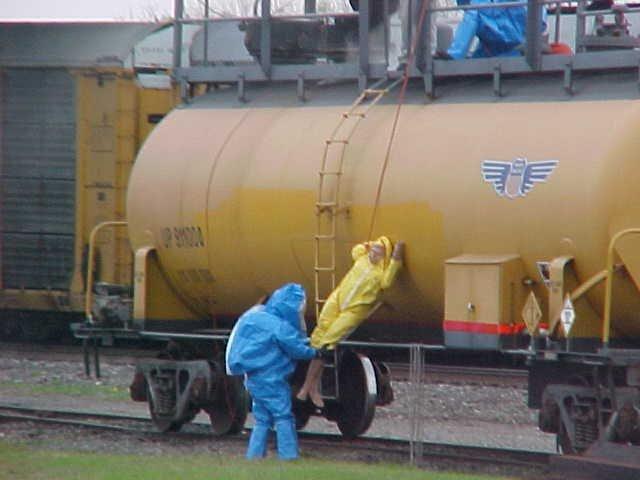 Fire fighters learning how to remove a victim from a dangerous rail car.